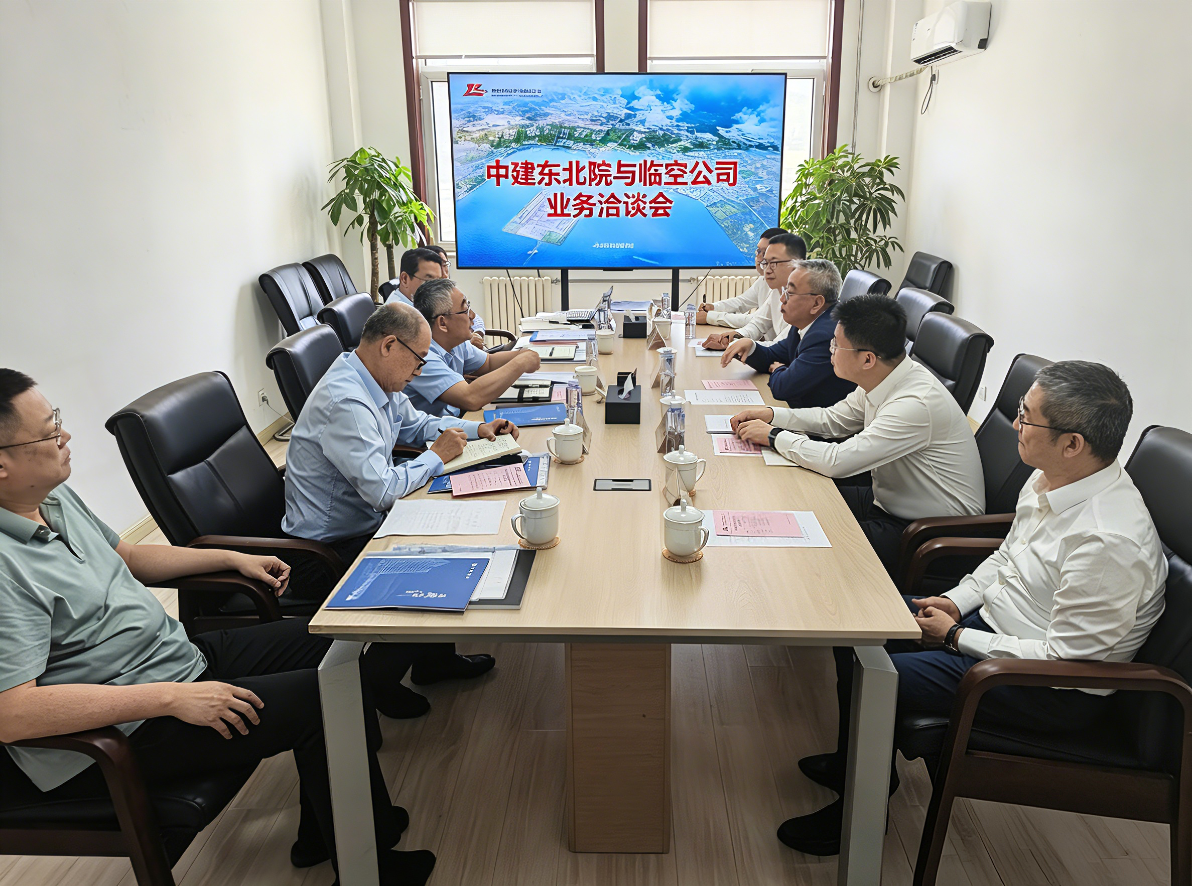 李海拜会大连机场集团副总经理、大连临空建设发展有限公司党委书记、董事长王曰承.png